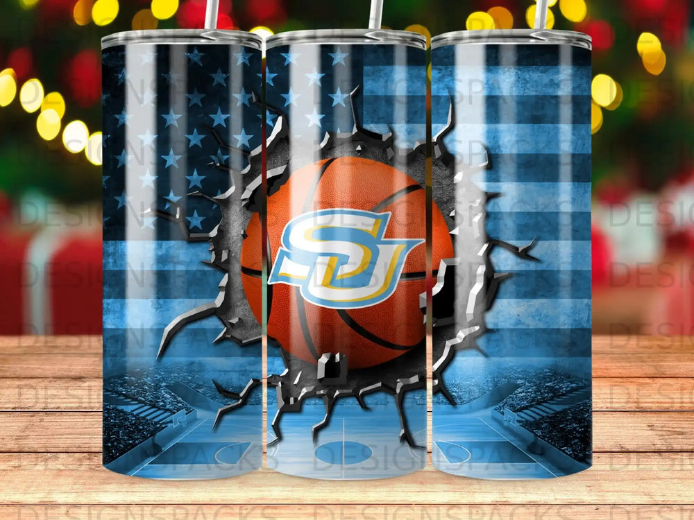 Basketball cracked through an American flag design on a blue tumbler.