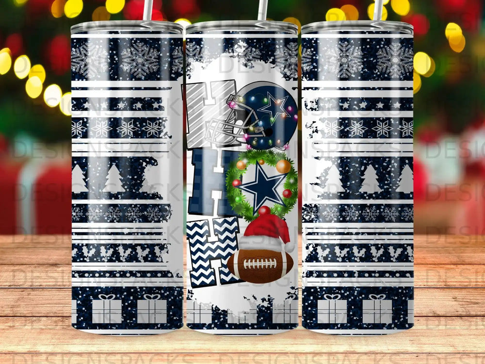 Dallas Cowboys themed tumbler with snowflakes, ornaments, and gift boxes.