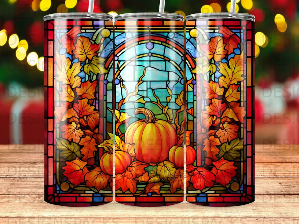 Stained glass tumbler with autumn leaves, pumpkins, and a harvest moon design.