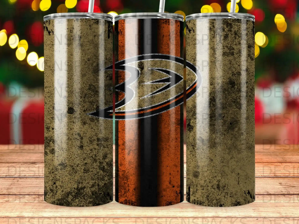 Anaheim Ducks logo on a distressed, dark orange and black tumbler.