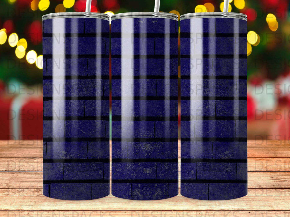 Dark blue and black plaid tumbler with blurred colorful bokeh lights in background.