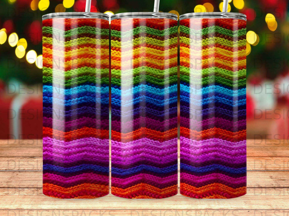 Three tumblers with a colorful striped knit pattern.