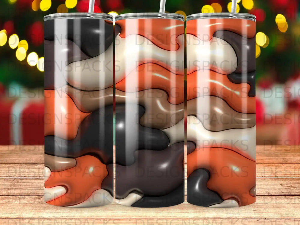 Three tumblers with abstract camouflage pattern in shades of brown, black, and grey.