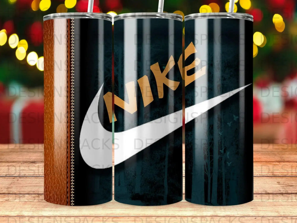 Three tumblers with black, brown, and forest green Nike logos.