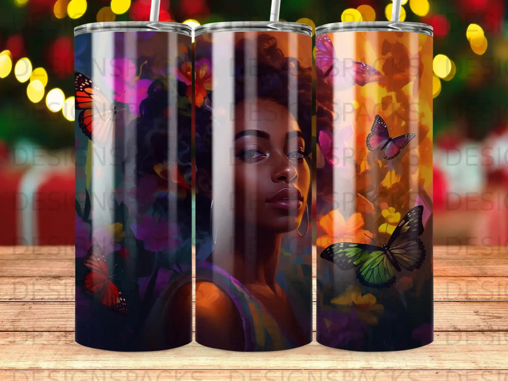 Tumbler with butterflies and floral pattern featuring a woman's face.