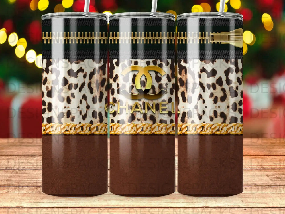 Chanel logo on leopard print tumbler with gold zipper detail.