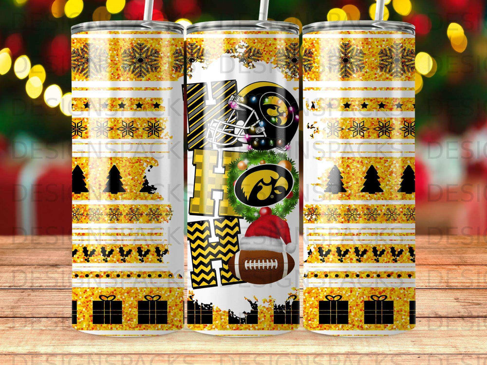 HO HO HO graphic with football and holiday snowflakes on a tumbler.