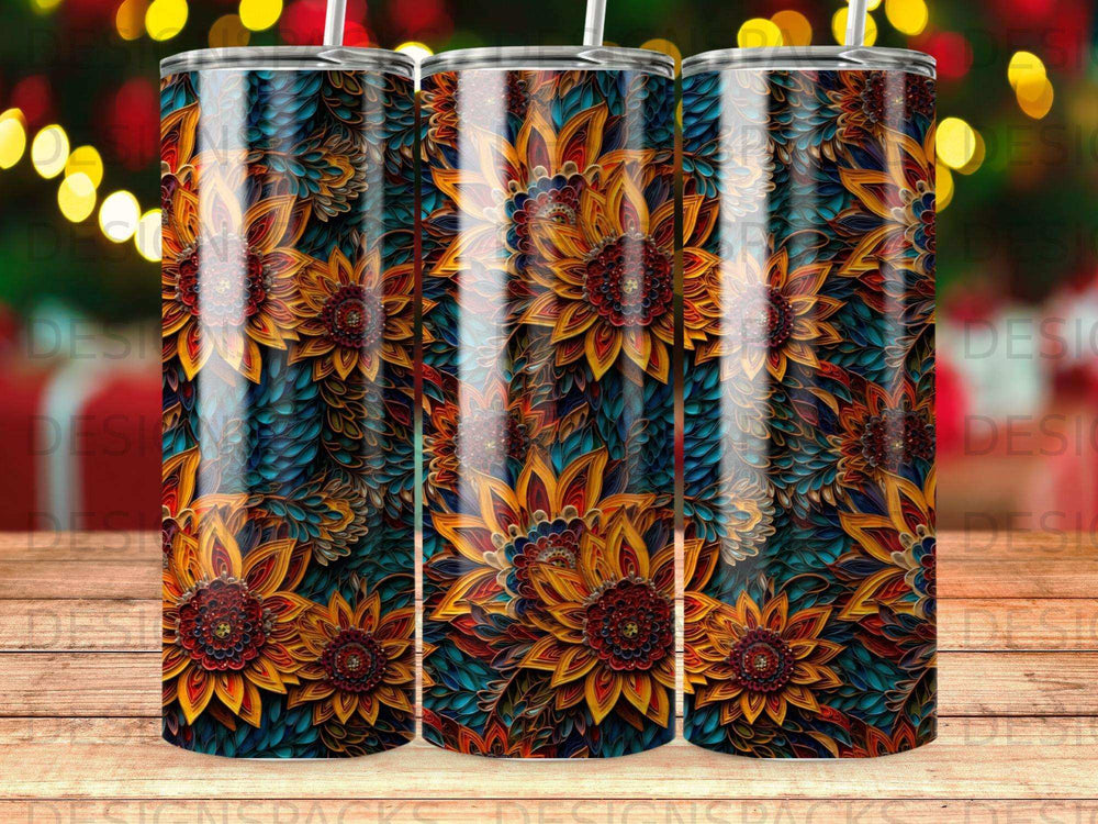 Three tumblers with a detailed floral pattern in warm colors and dark blues.