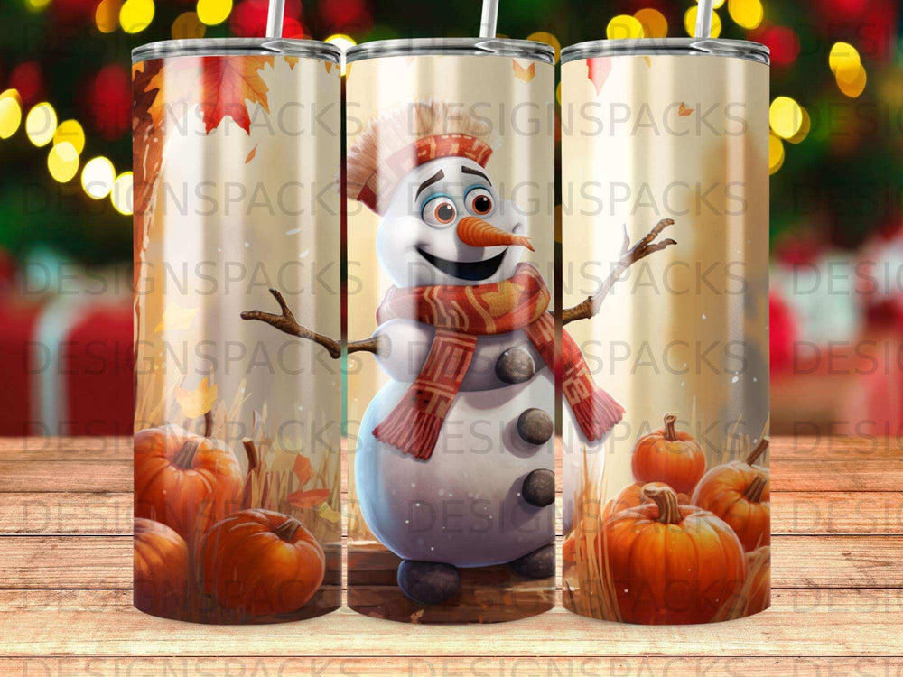 Snowman with pumpkins and autumn leaves on a tumbler.