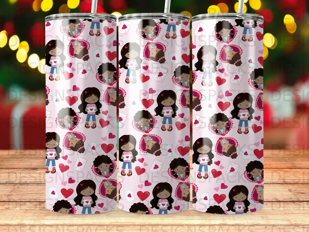 Trio of tumblers with cartoon girl, heart, and envelope pattern.