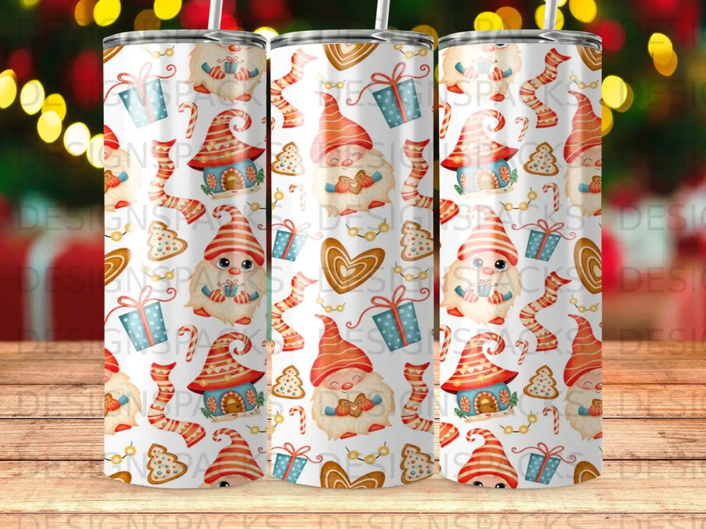 Gnomes, gifts, candy canes, and gingerbread cookies on a white Christmas tumbler.