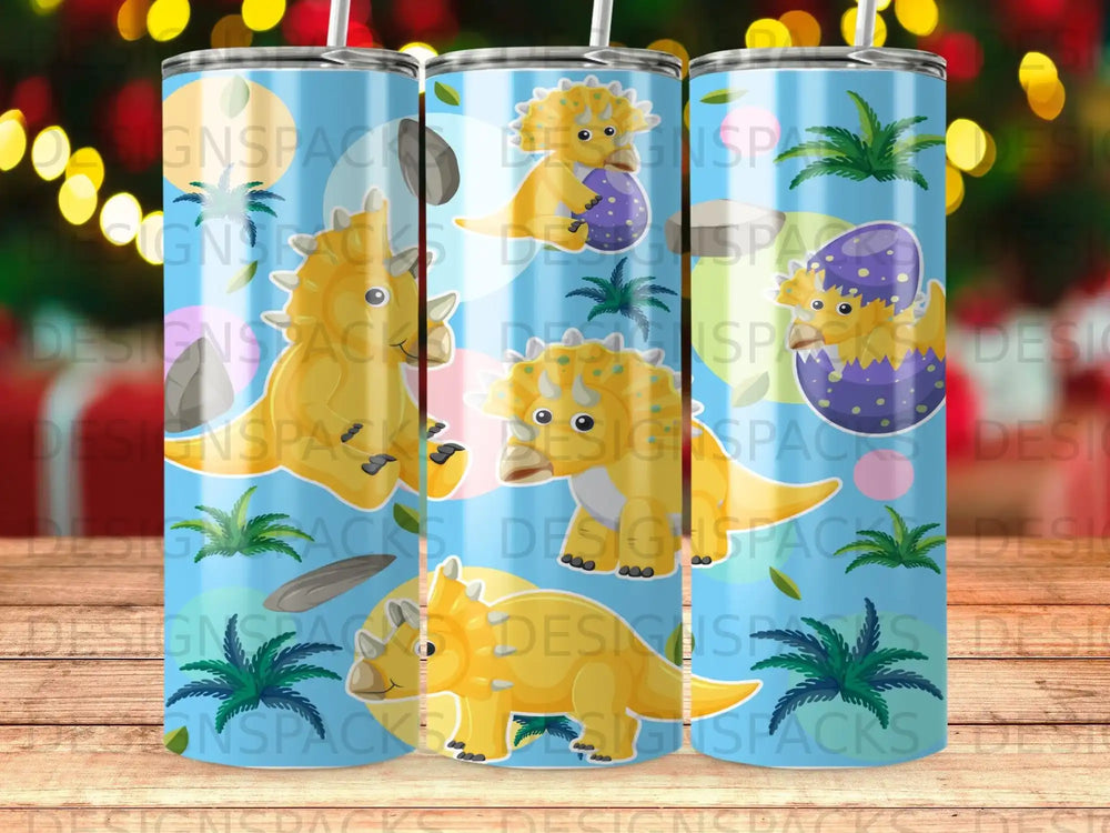 Blue tumbler with cartoon dinosaurs and plants.