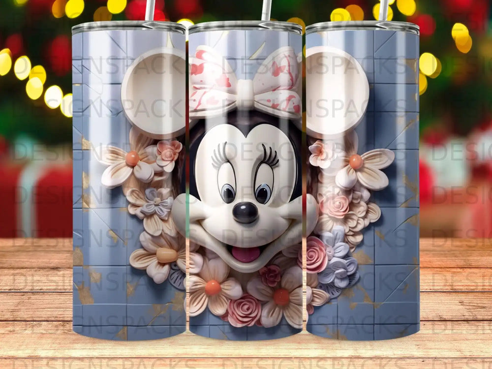 Minnie Mouse adorned with flowers on a blue and gold patterned tumbler.