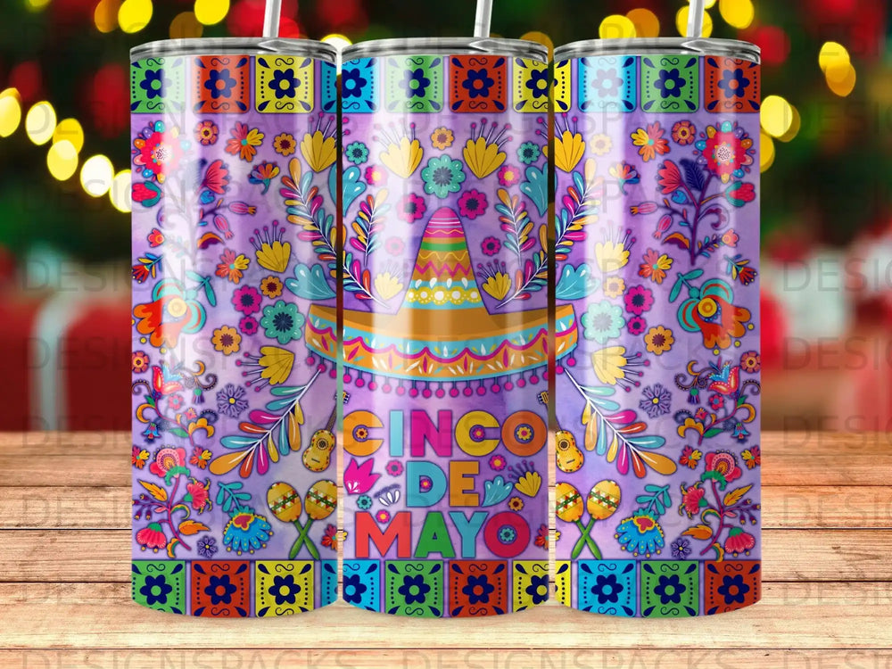 Tapered tumbler with Cinco de Mayo design featuring a sombrero, maracas, and flowers.