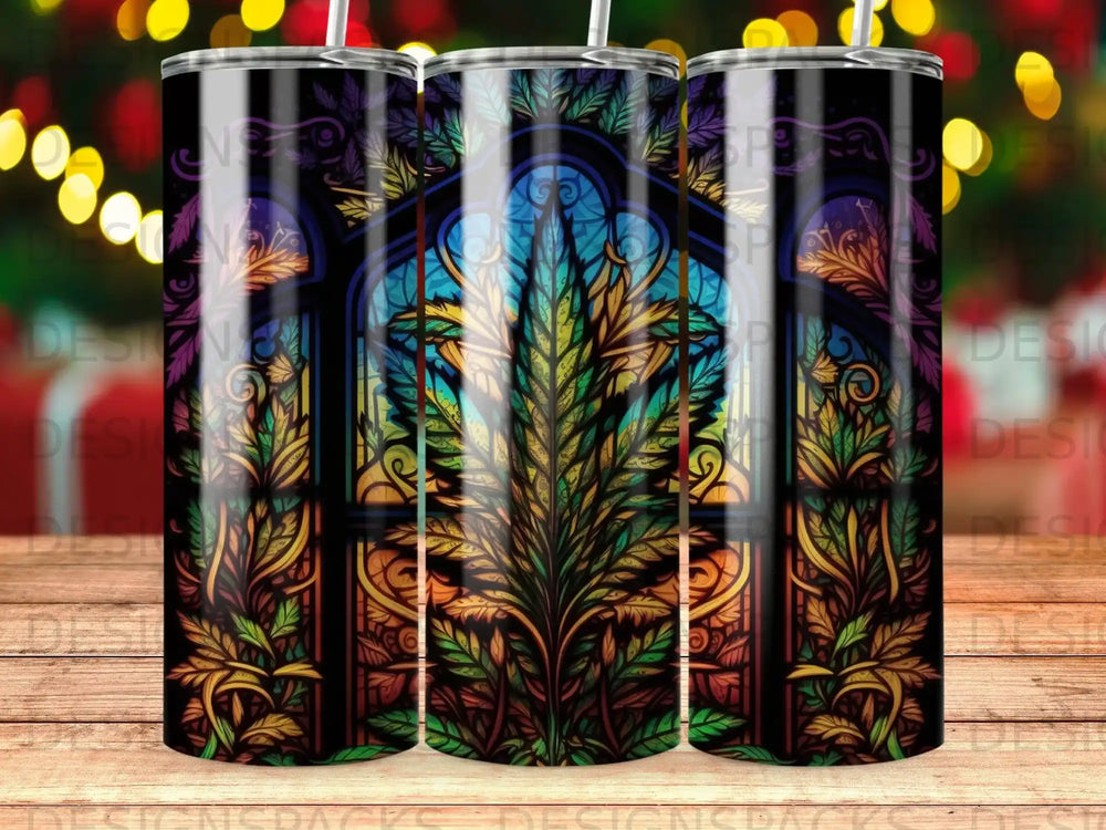 Stained glass tumbler with cannabis leaf and floral designs.