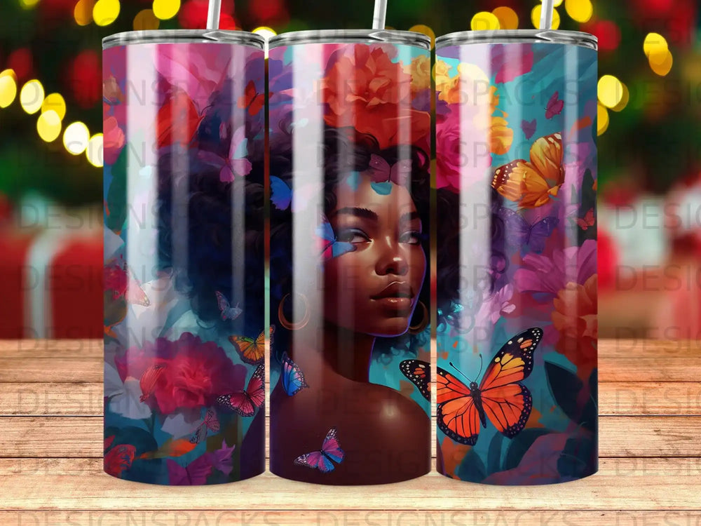 Woman with colorful butterflies and floral accents on a patterned tumbler.