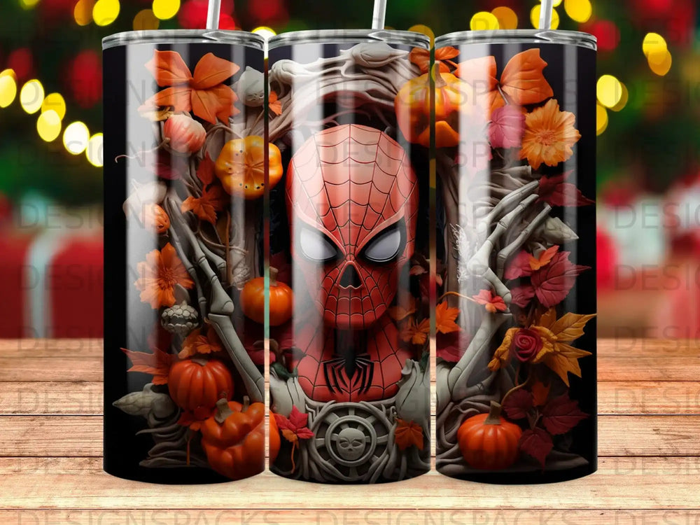 Spiderman mask surrounded by pumpkins and fall leaves on a tumbler.
