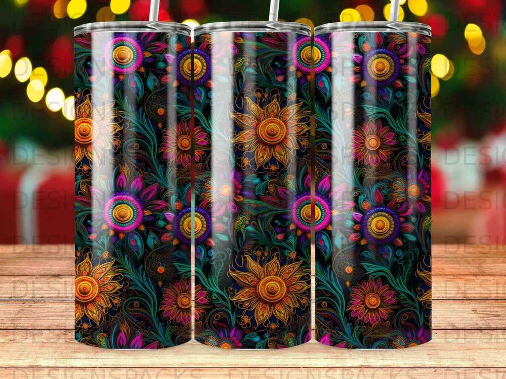 Tumbler with vibrant floral pattern featuring orange, pink, and blue sun-like designs.