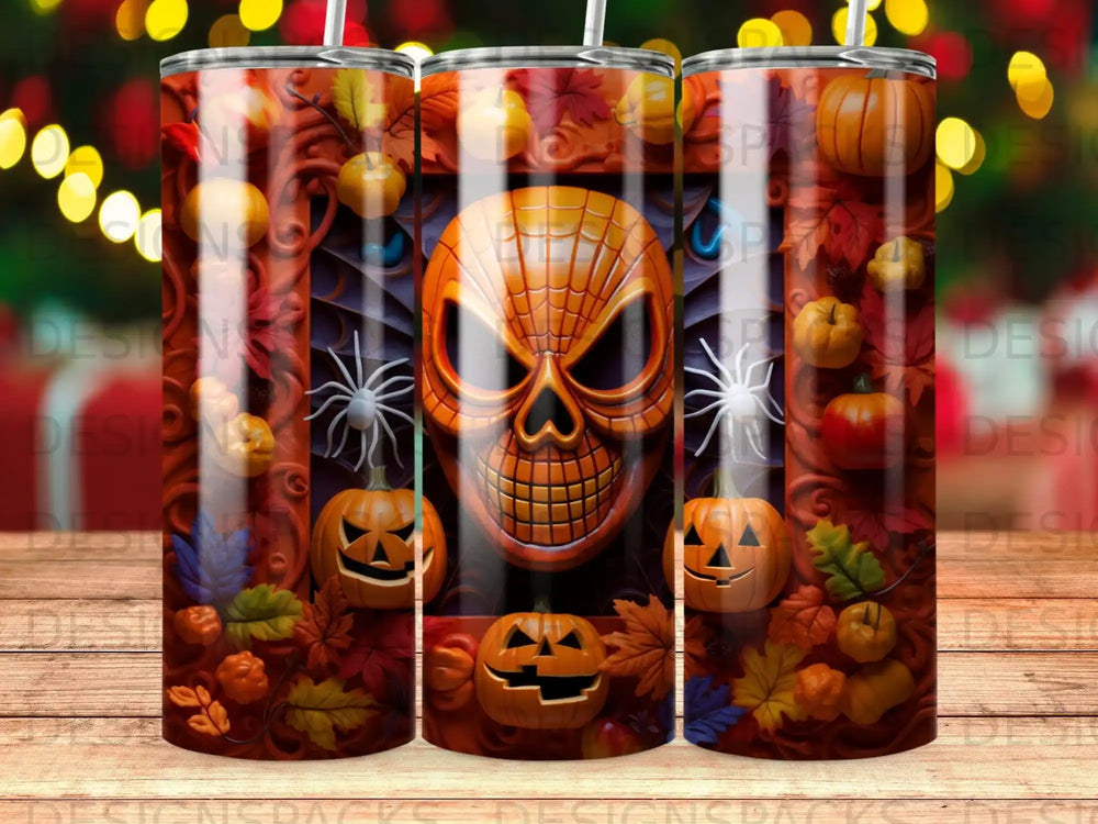 Halloween tumbler with skull, pumpkins, and autumn leaves.