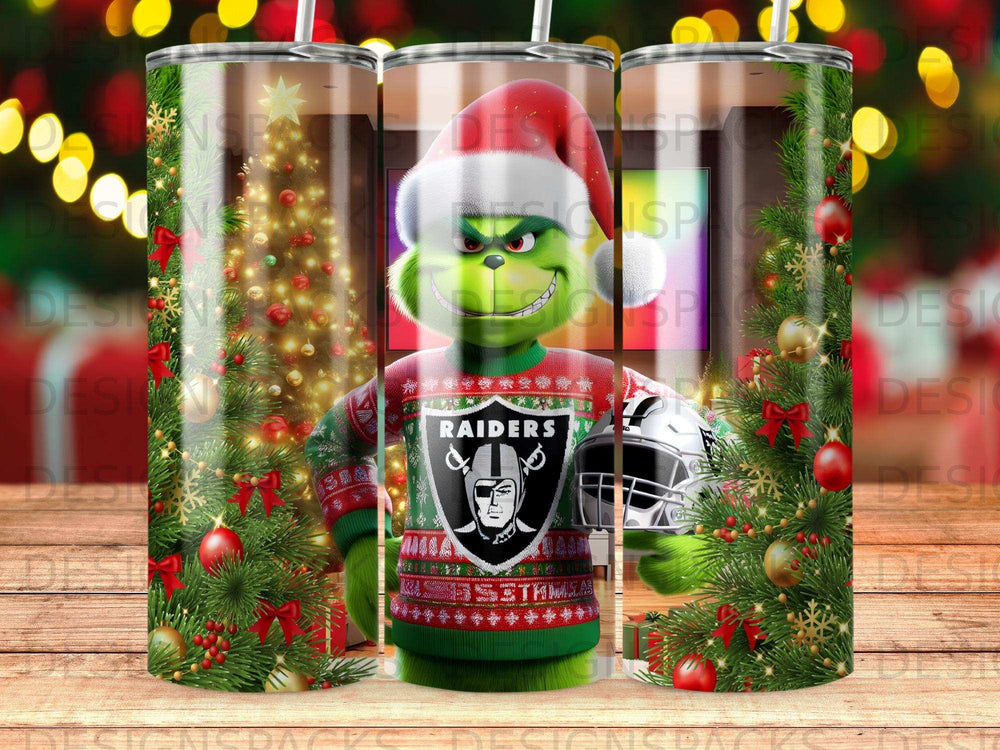 The Grinch in a Raiders sweater holding a football, surrounded by Christmas decorations.