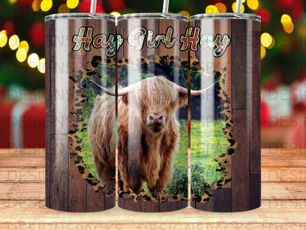 Highland cow with "Hay Girl Hay" text within a wood and leopard print circle.