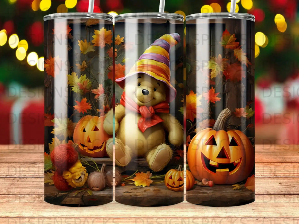 Winnie the Pooh sits with pumpkins and autumn leaves, a festive Halloween design.