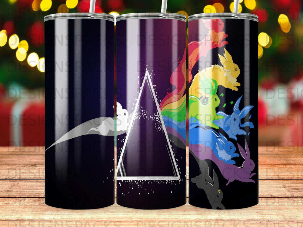 Three tumblers with a psychedelic prism and rabbits design.
