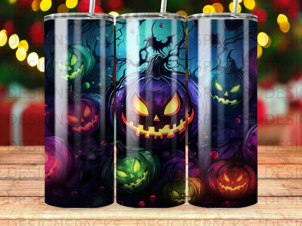 Halloween tumbler with glowing jack-o'-lanterns and bats against a dark background.
