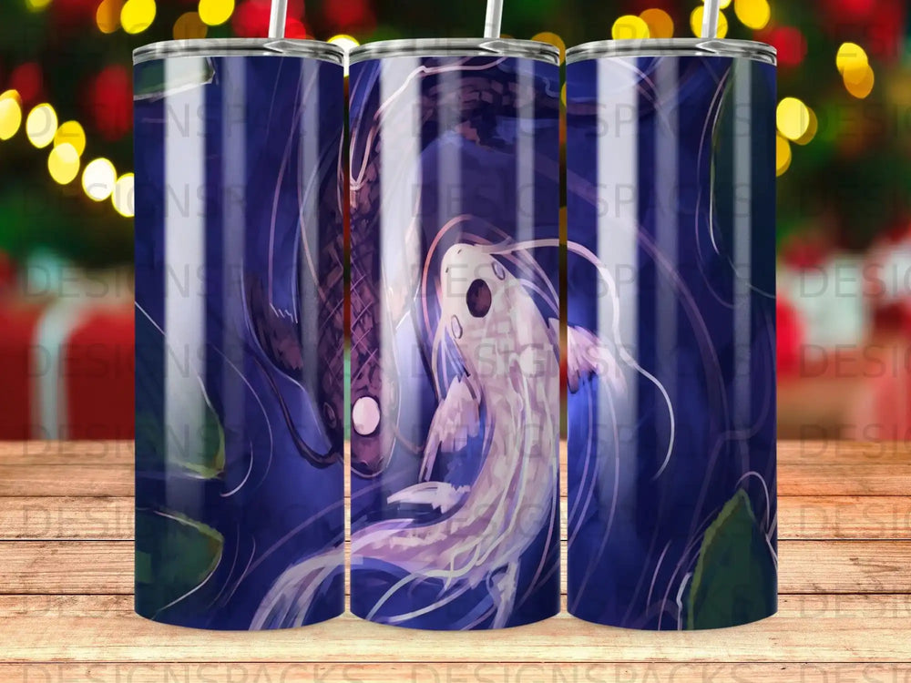 Koi fish swim in dark blue water with lily pads.