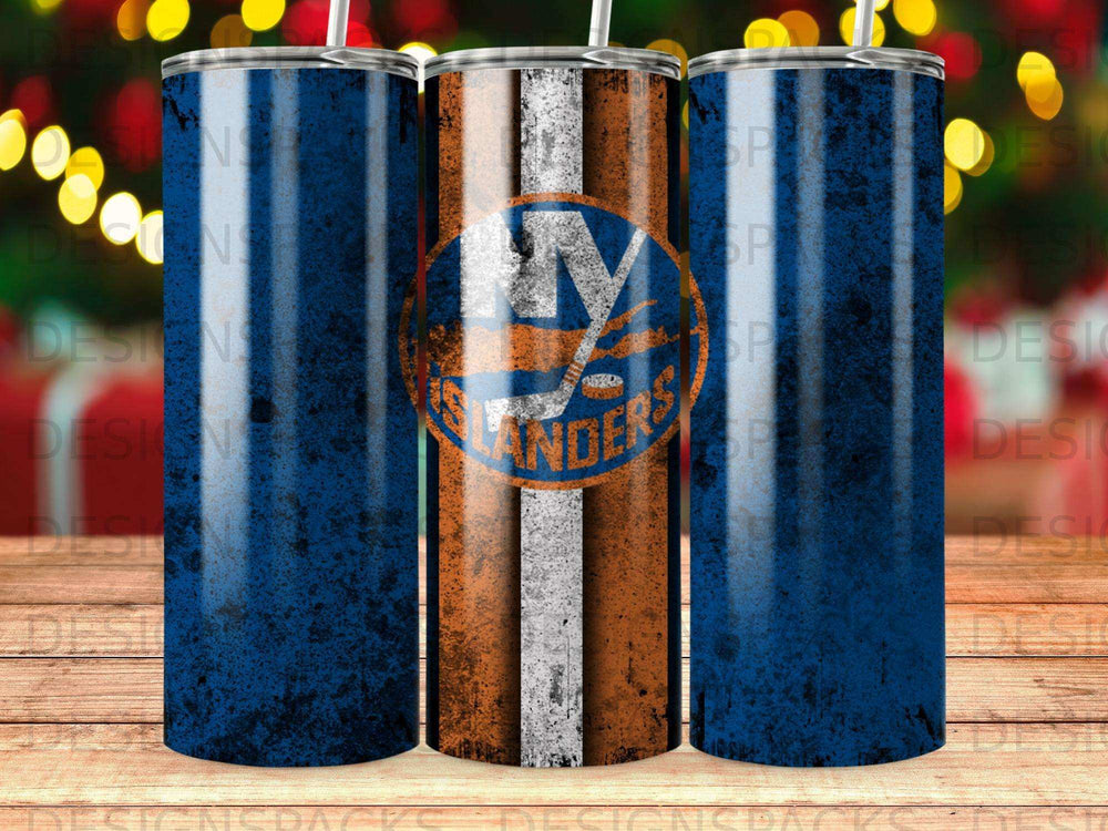 New York Islanders logo on a textured tumbler with a blurred Christmas tree background.