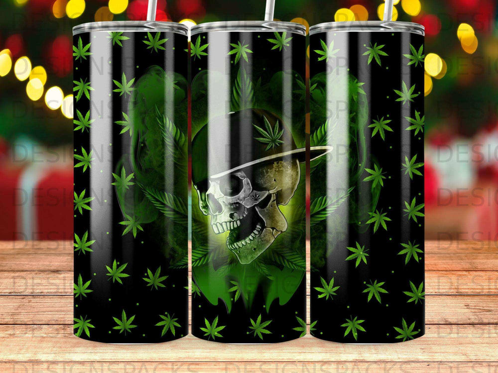 Green skull wearing a hat with cannabis leaves and stars on a black tumbler.
