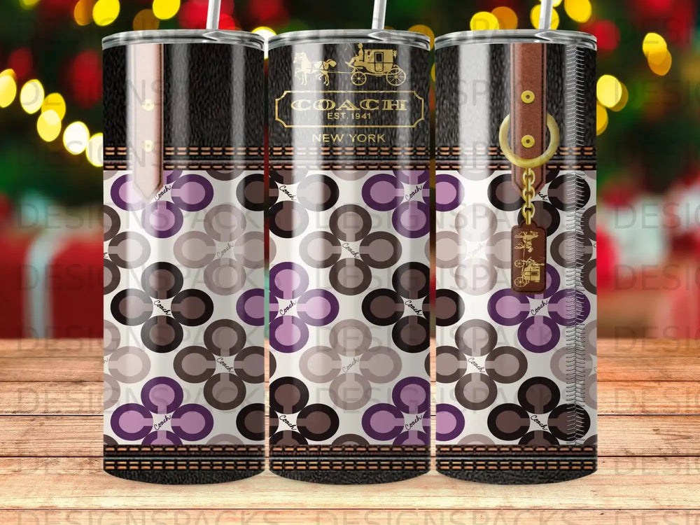 Coach tumbler with classic pattern and "Coach New York" logo.
