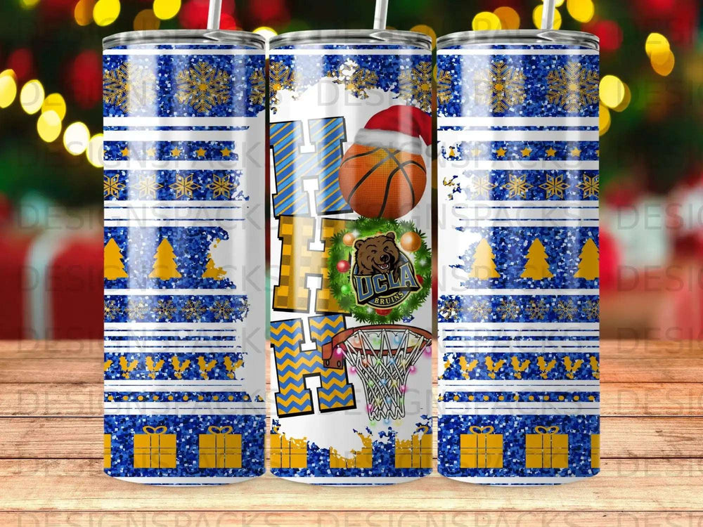 UCLA Bruins basketball holiday tumbler with blue, gold, and white snowflake pattern.