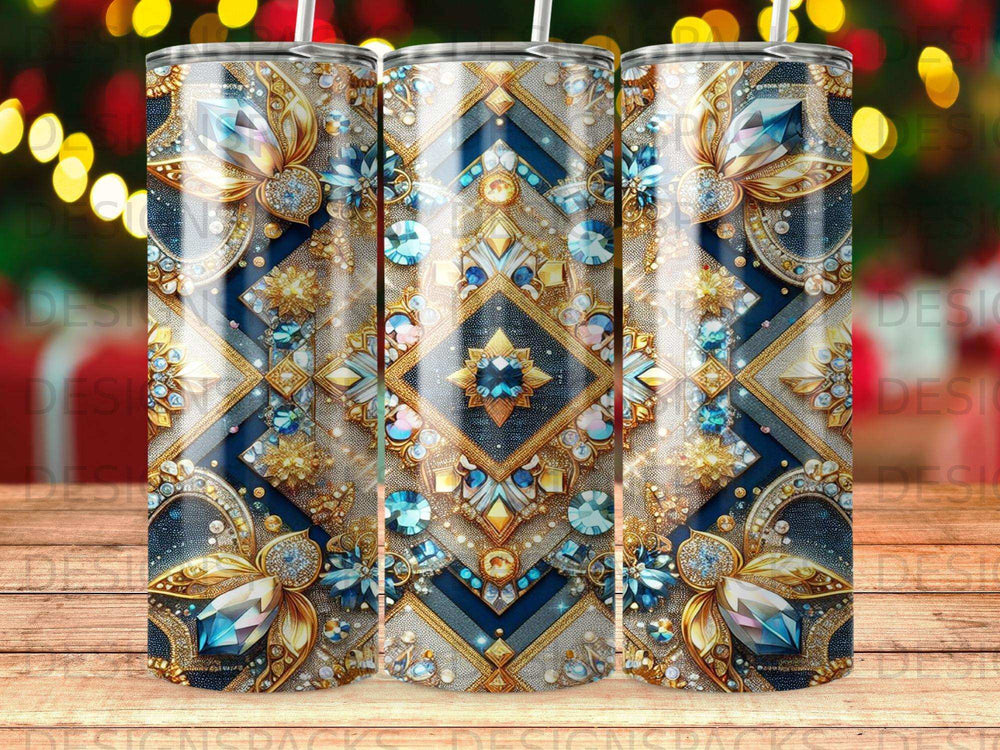 Triptych of patterned tumblers with ornate gold, blue, and clear gem embellishments.