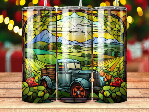 Vintage blue truck in stained glass farm landscape with mountains and sun.