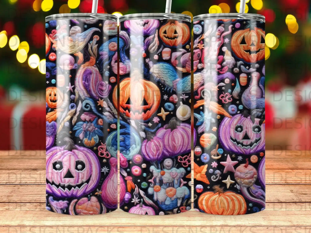 Halloween pumpkins and spooky creatures pattern on a tumbler.