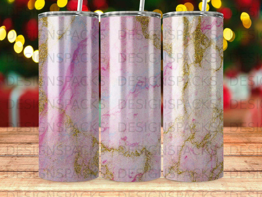 Three tumblers with pink and gold marble patterns, some with glitter.