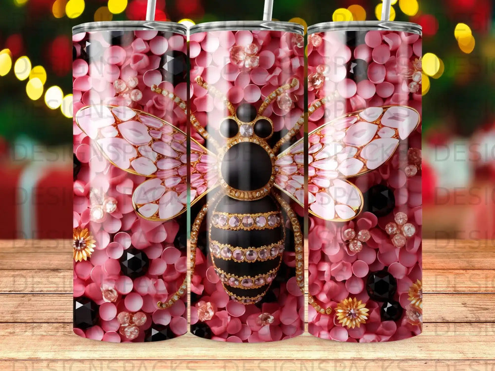 Pink and black glitter bee with floral accents on tumbler.