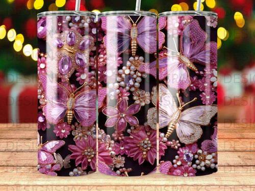Pink butterflies and floral embellishments on a dark tumbler.