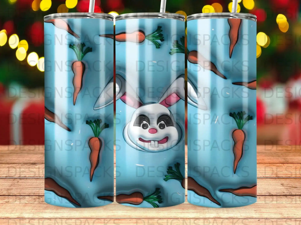 Blue tumbler with white bunny face and carrots, repeating pattern.