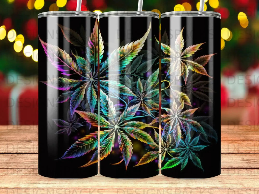 Black tumbler with colorful cannabis leaf design and bokeh background.