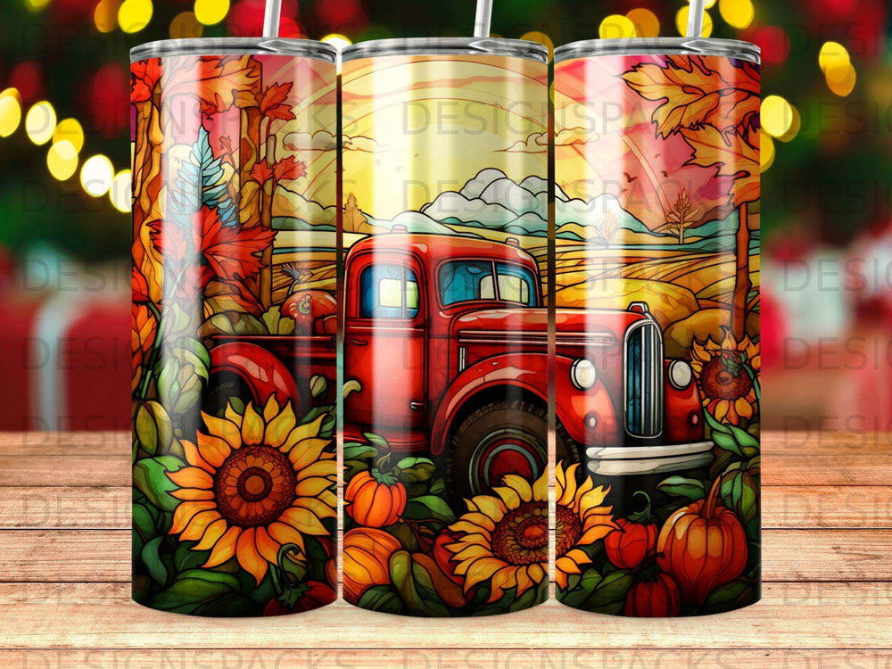 Red vintage pickup truck with sunflowers and pumpkins in autumn landscape.