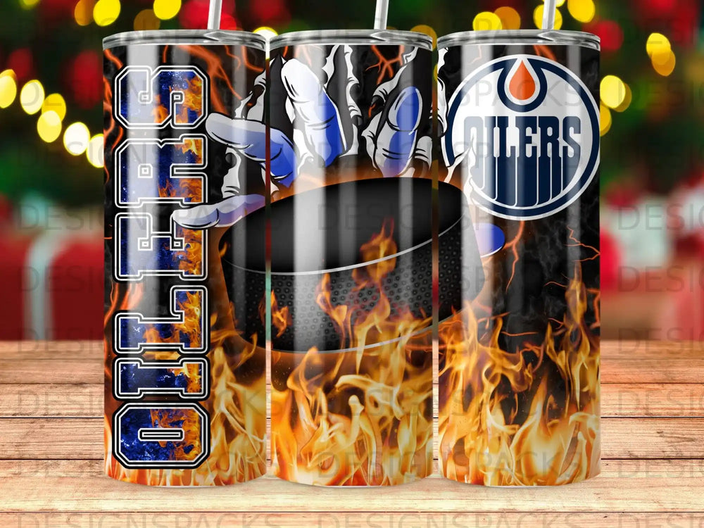 Edmonton Oilers hockey team logo and name with fiery background on a tumbler.