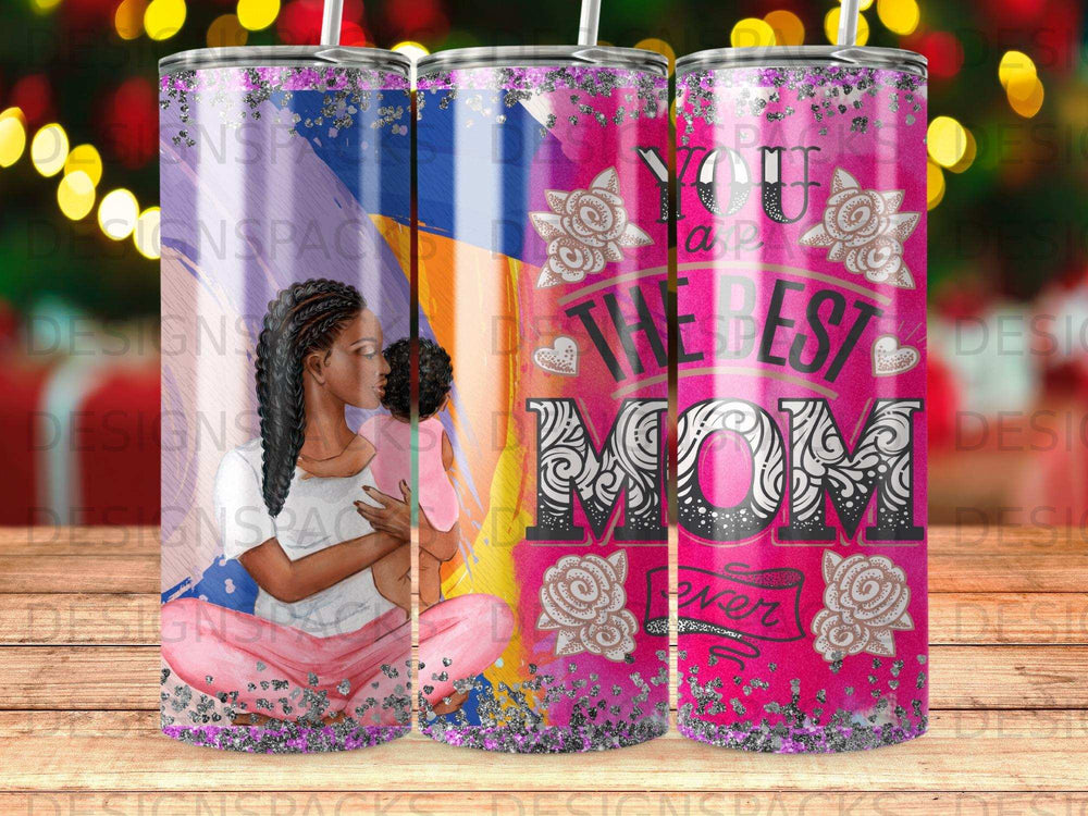 Mom and baby tumbler with floral and glitter designs.