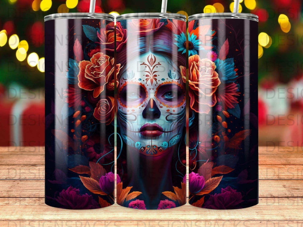 Sugar skull woman with floral accents on a patterned tumbler.