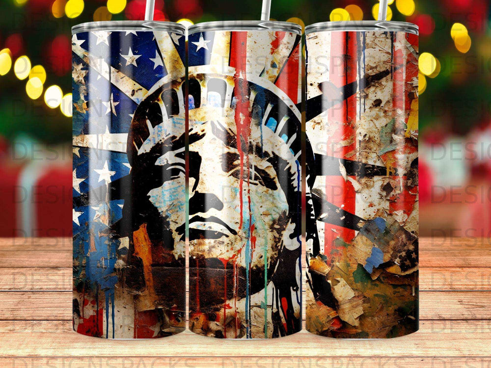 Distressed Statue of Liberty face with American flag accents on a tumbler.