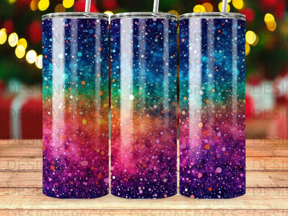 Tumbler with colorful speckled galaxy pattern in blues, purples, and oranges.