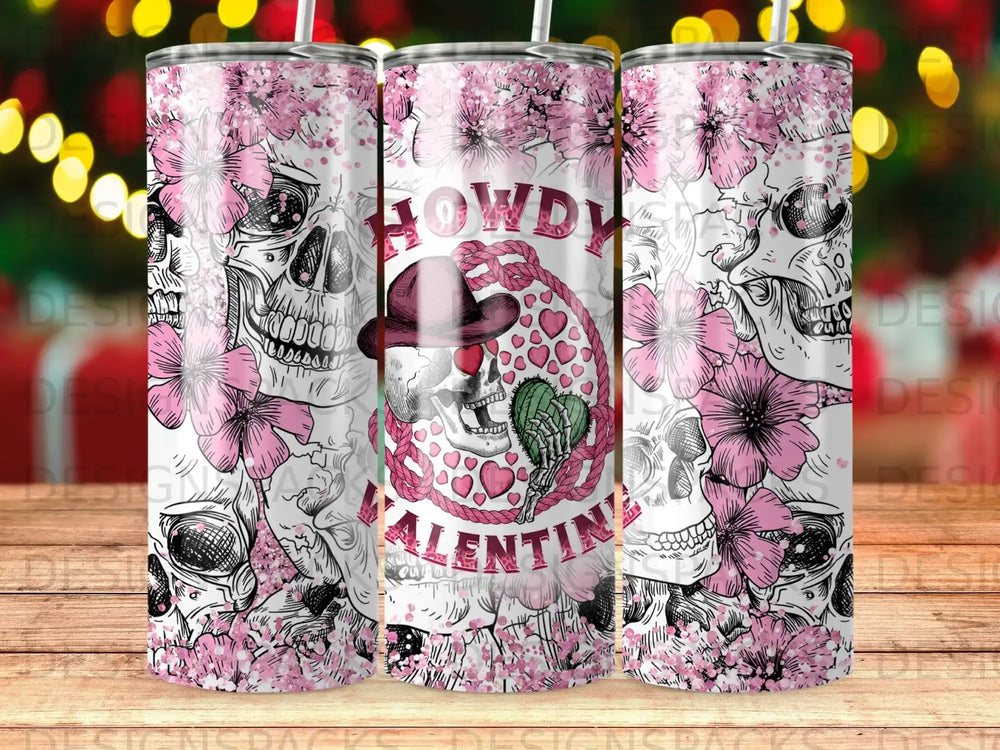Pink floral skull tumbler with "Howdy Valentine" text.