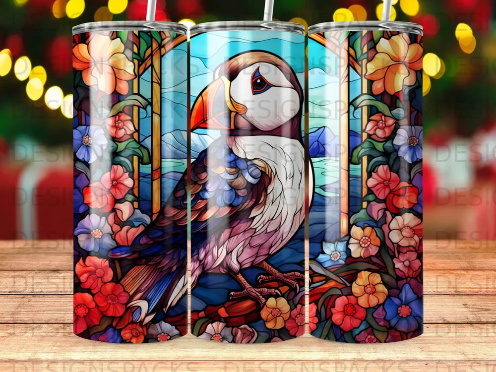 Puffin in stained glass design with floral border and bokeh lights.