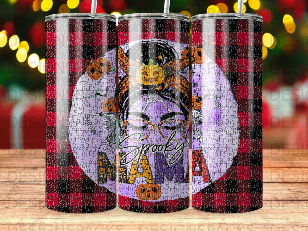 "Spooky Mama" tumbler with pumpkins, skeleton pattern, and plaid background.